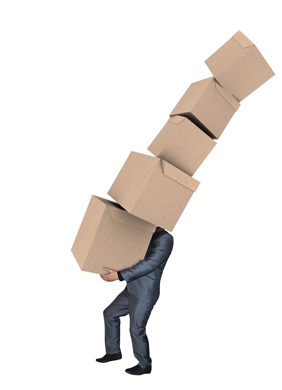 man carrying moving boxes relocation